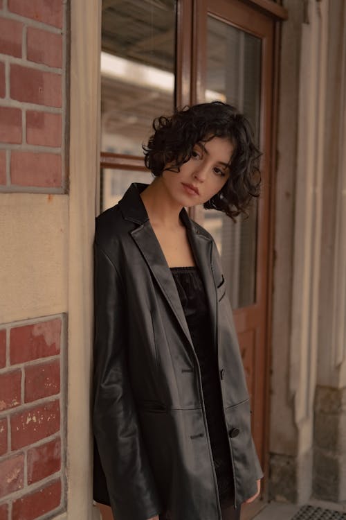 Portrait of a Woman Standing Outside a Building