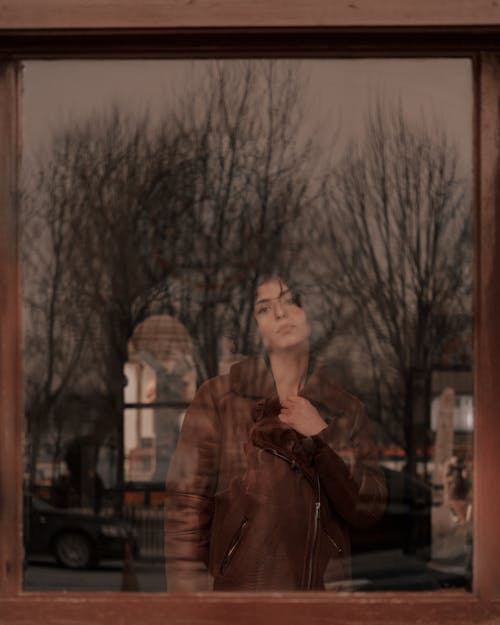 A Woman in Brown Leather Jacket