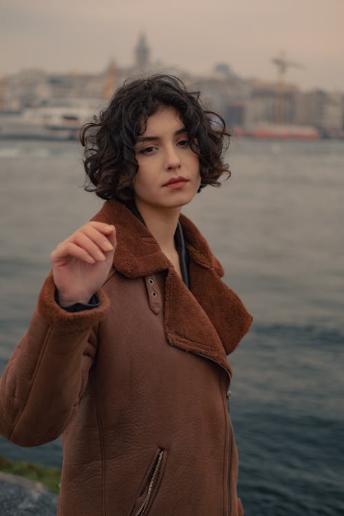 A Woman in Brown Coat