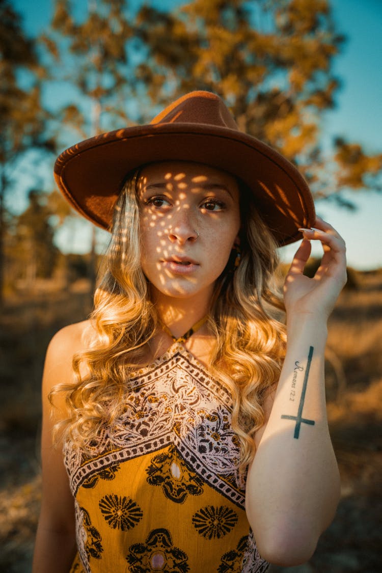 Shadow And Sunlight Forming Patterns On Womans Face