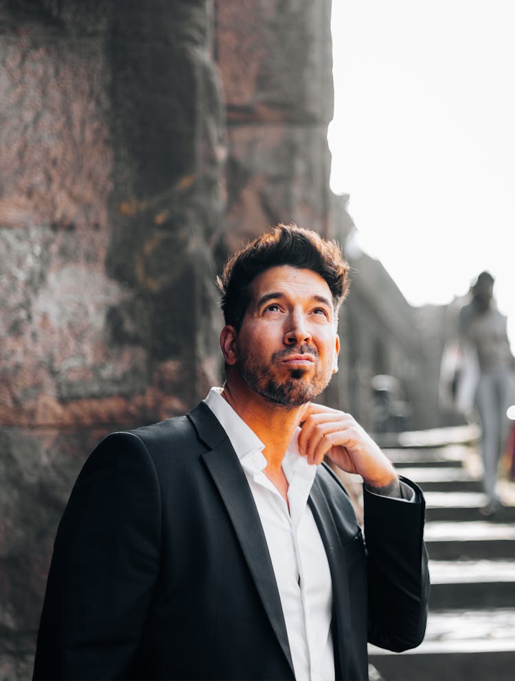 Man In Suit Looking Up