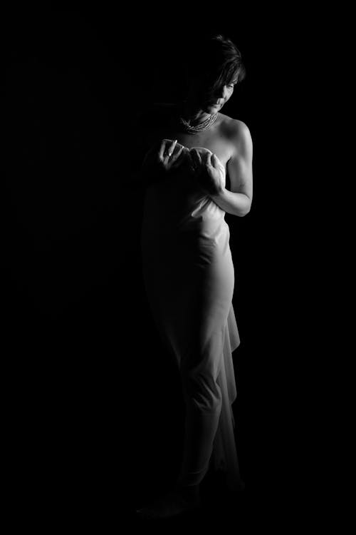 Free Grayscale Photo of a Woman in a Dress Stock Photo
