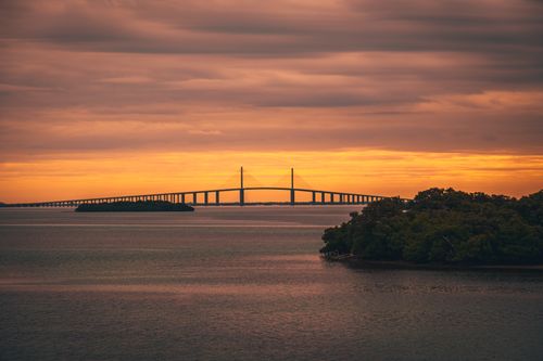 Free Dramatic sunset over the Sunshine Skyway Bridge, St. Petersburg, FL. Stock Photo