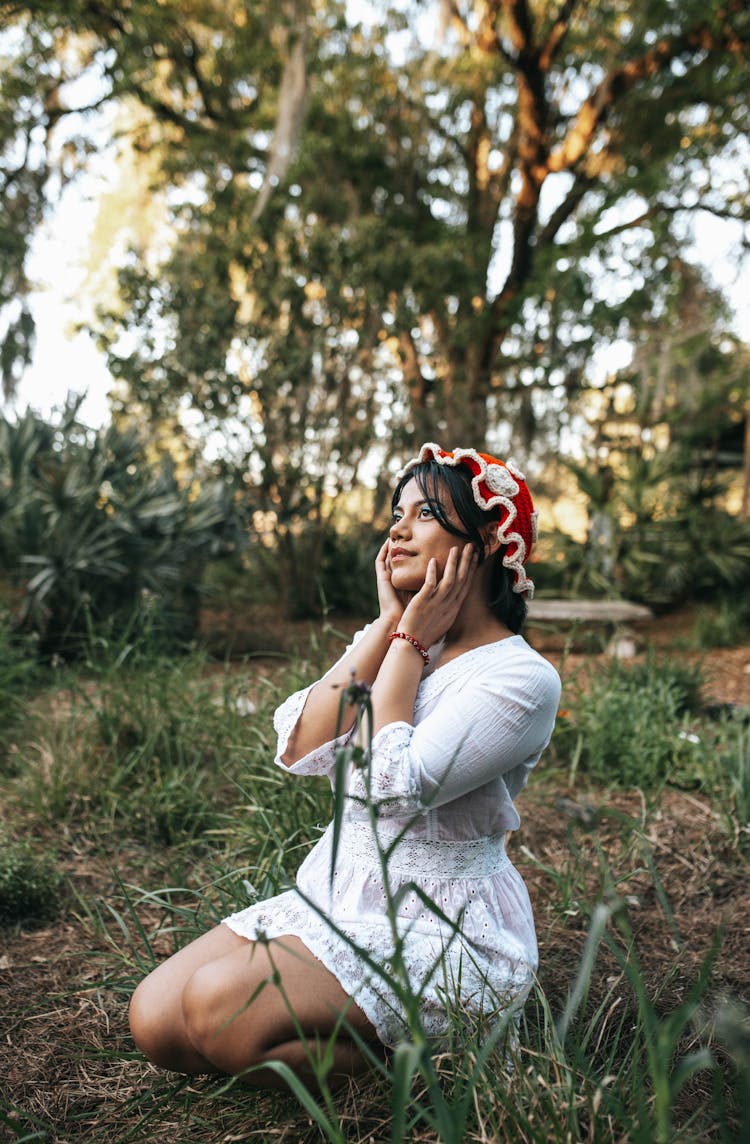 Woman In Dress Crouching