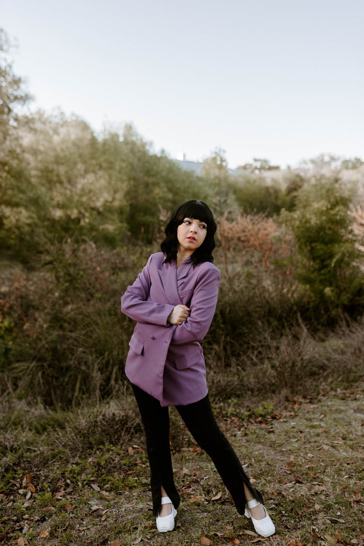 Woman In Purple Coat