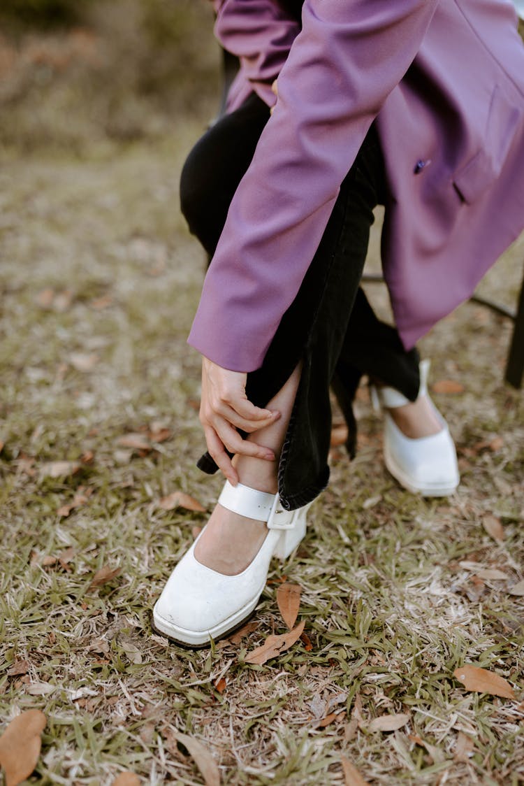 Legs Of Person In Purple Coat