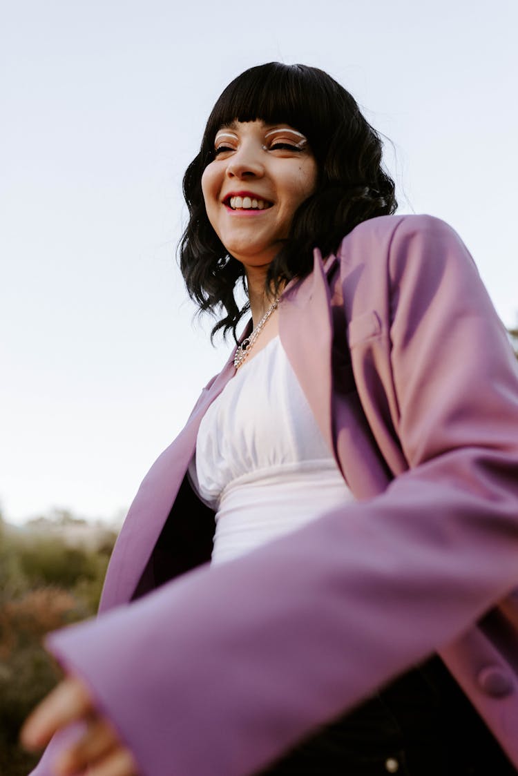 Woman In Coat Smiling