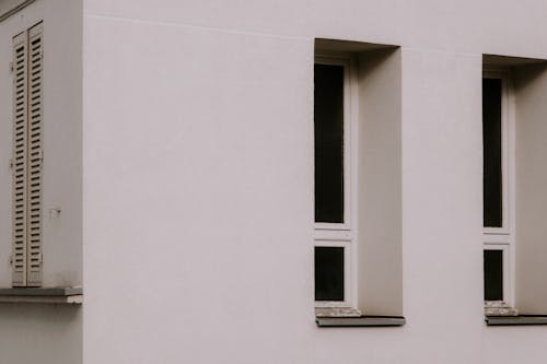 White Concrete Wall with Glass Windows