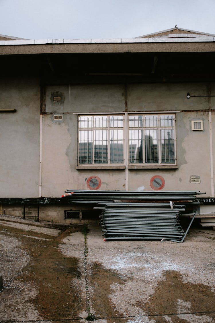 Reflection In Warehouse Window