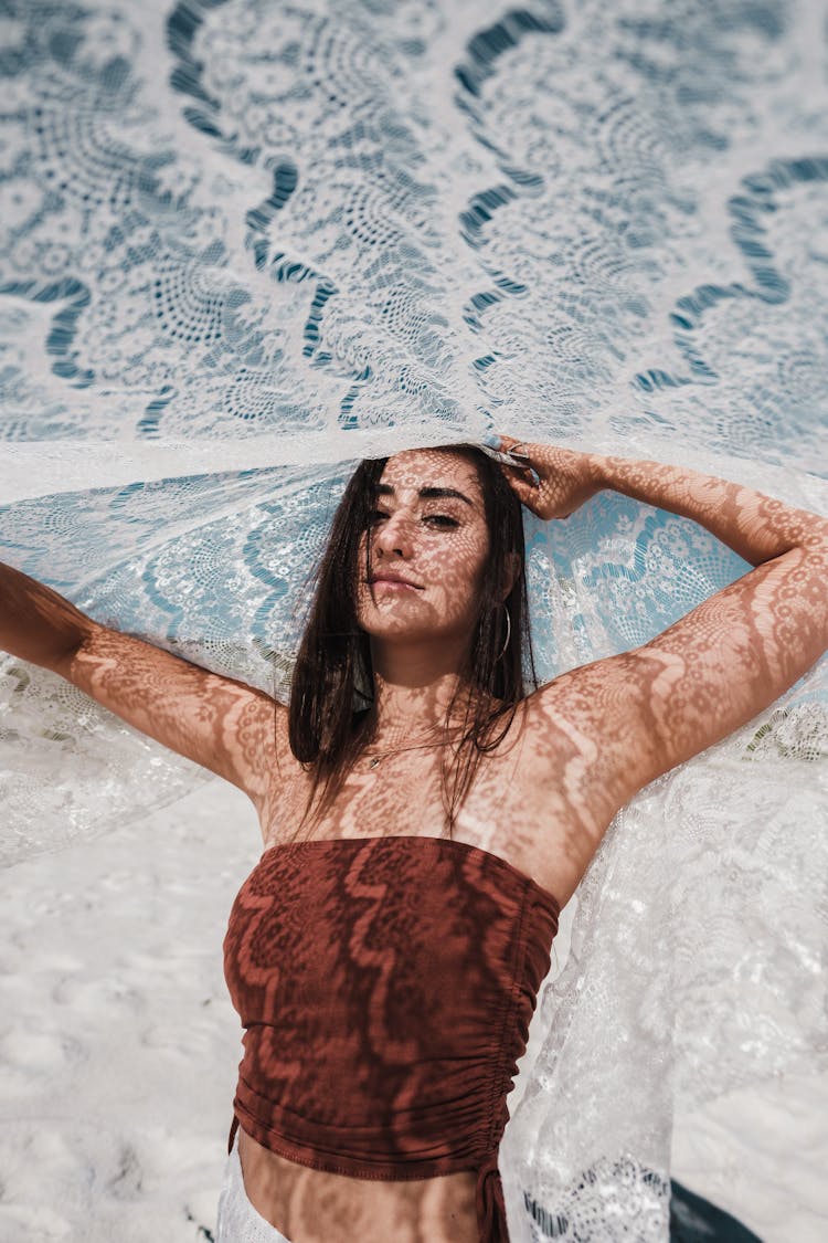 Woman Posing With Fabric Over Head