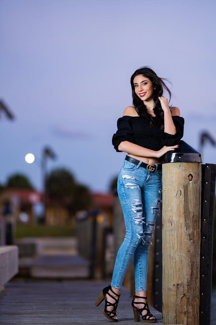 Woman Posing On Pier