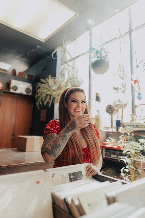 Woman with Tattoos Smiling