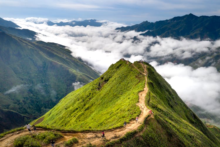 Tourists On Mountain Trail 