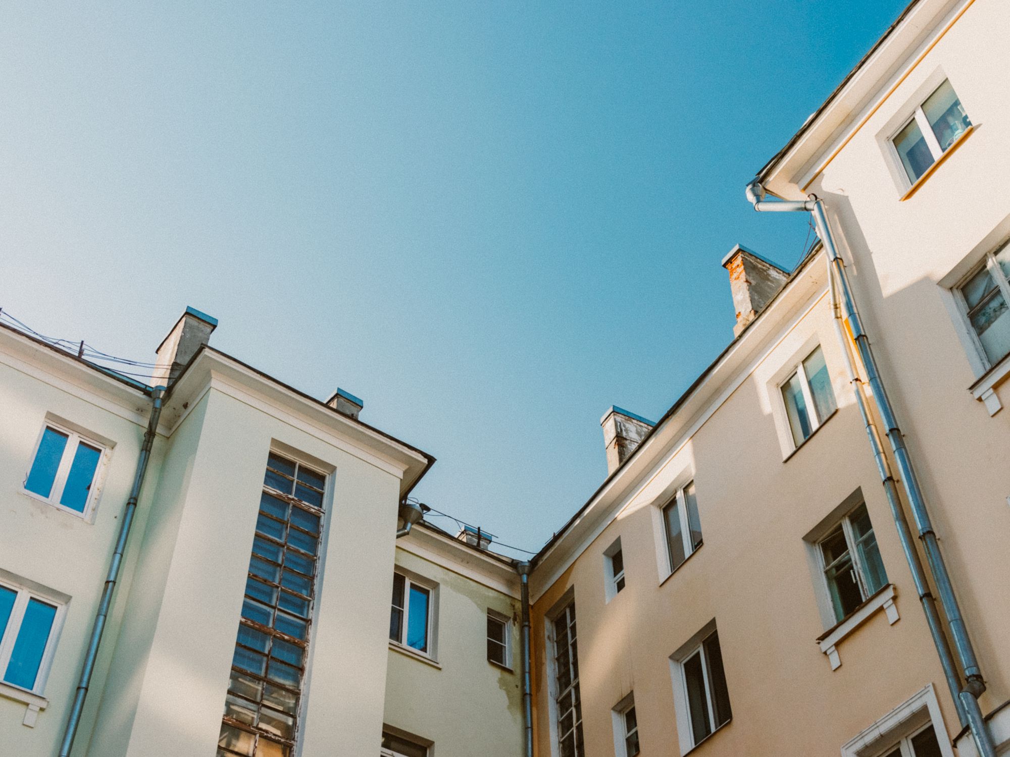 Exterior Painting in Crayford, Bexley — painter refreshing a house exterior in weatherproof paint