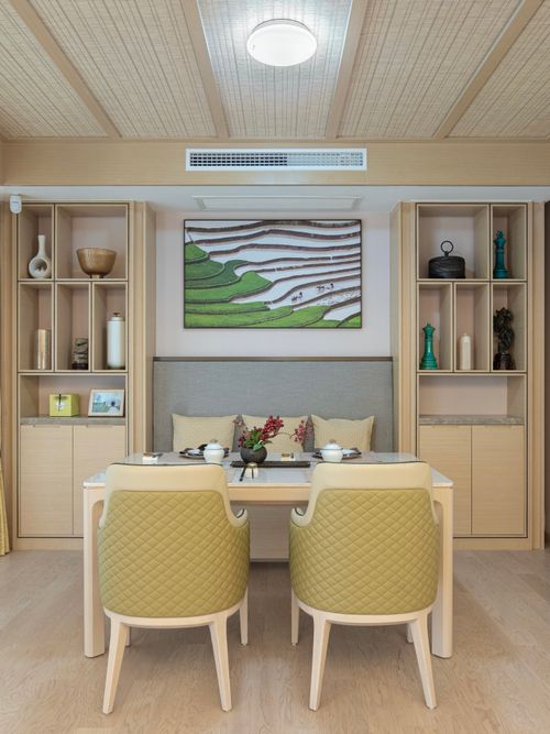 Free Stylish indoor dining space featuring modern furniture and decor elements. Stock Photo
