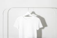 White T-Shirt hanging on a Rack