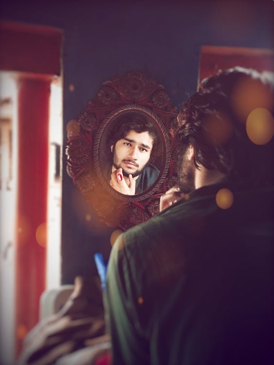 Man's Reflection on a Mirror · Free Stock Photo