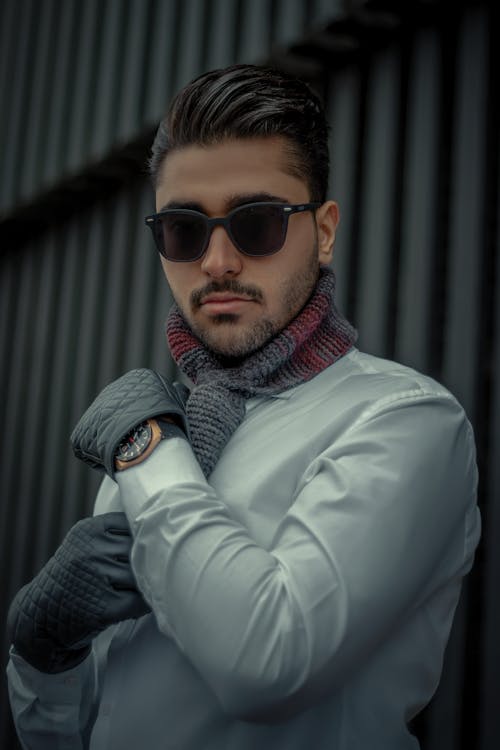 Close-up Photo of Man White Long Sleeves and Black Sunglasses 