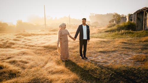 Couple holding each other's Hands 