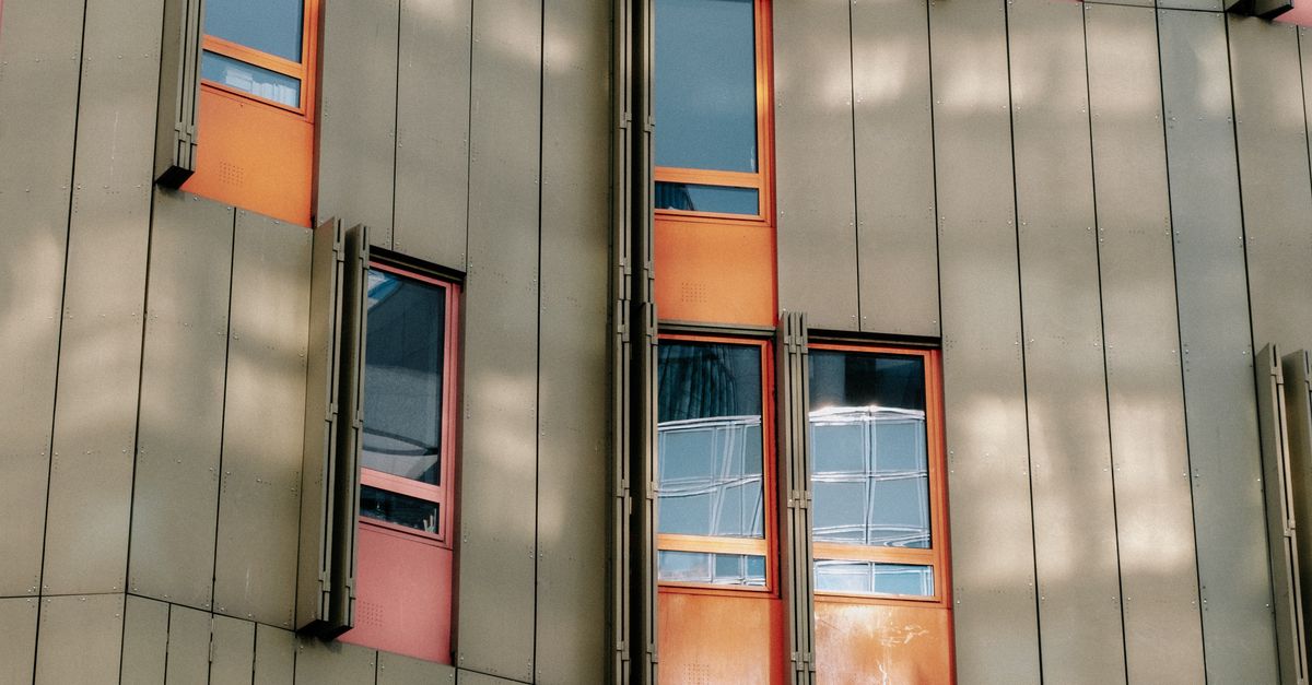 Modern Exterior Window Design of a Building · Free Stock Photo