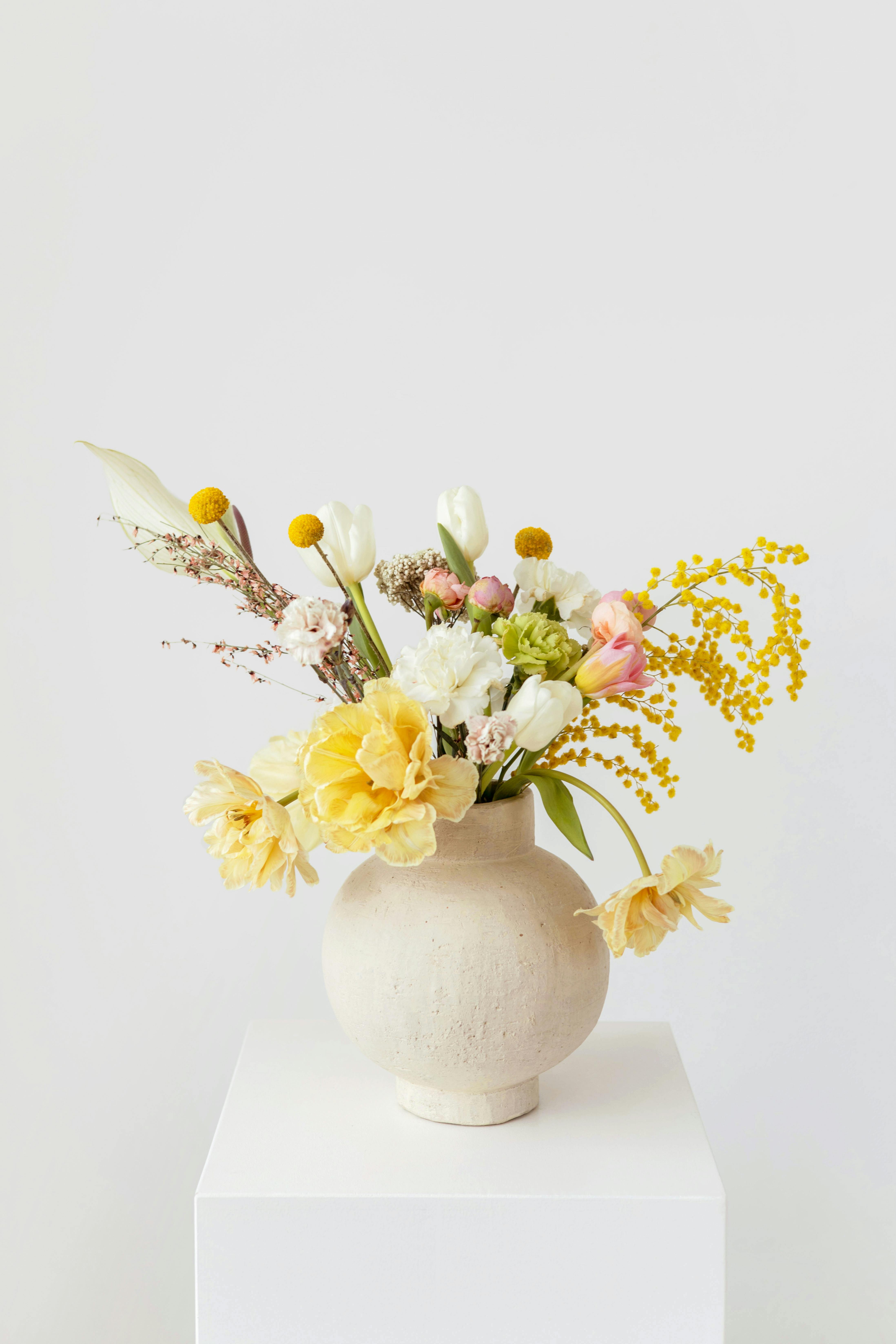 beautiful colorful flowers on a ceramic vase