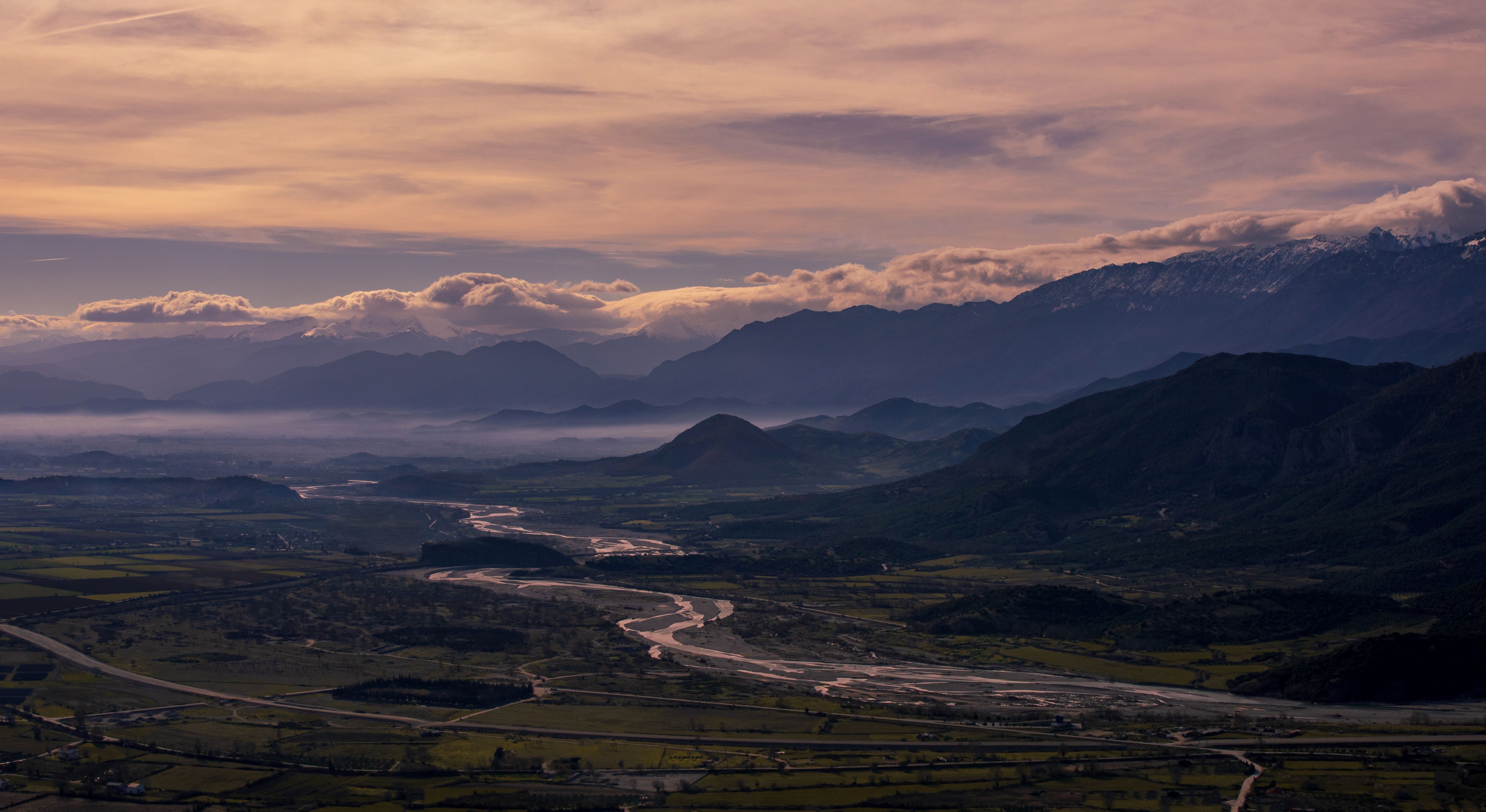 Aerial View of City Near Mountain · Free Stock Photo