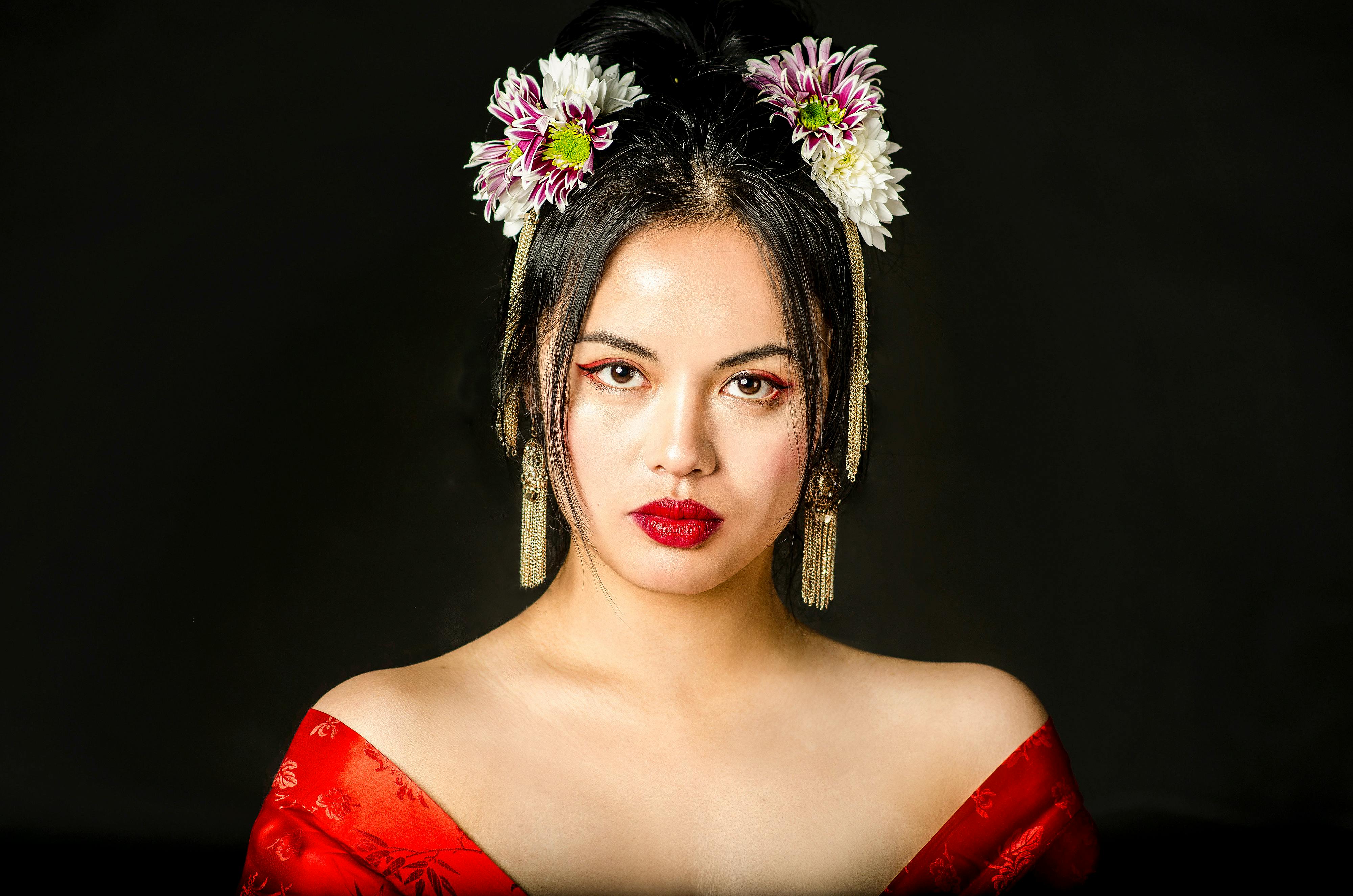Beautiful Woman with Flowers on her Hair · Free Stock Photo