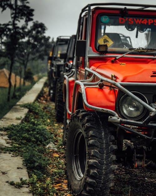 Off Road Vehicles Parked on the Road