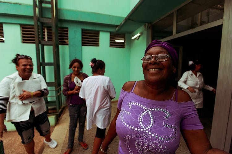 Smiling People Near Hospital