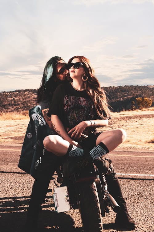 Free Affectionate Couple on a Motorycle Stock Photo