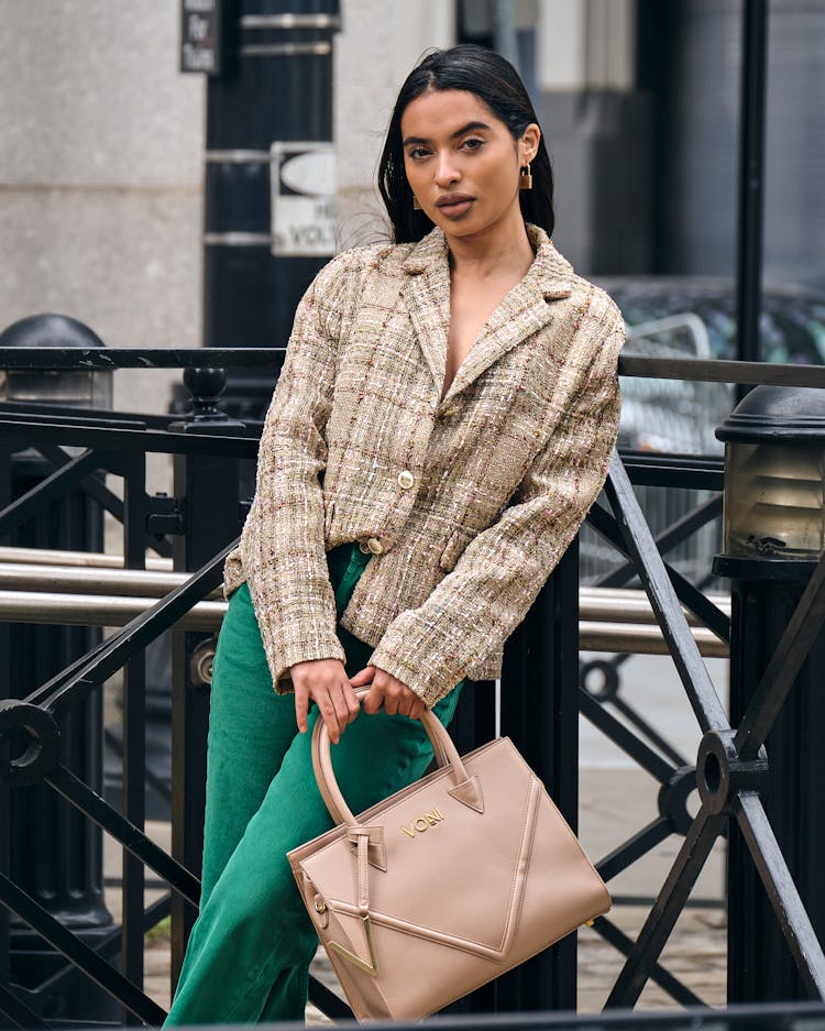 Stylish Woman Holding A Bag