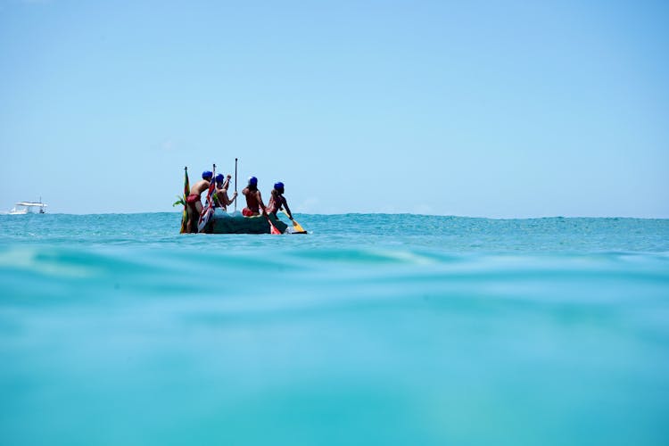 Group Of Men On A Boat 