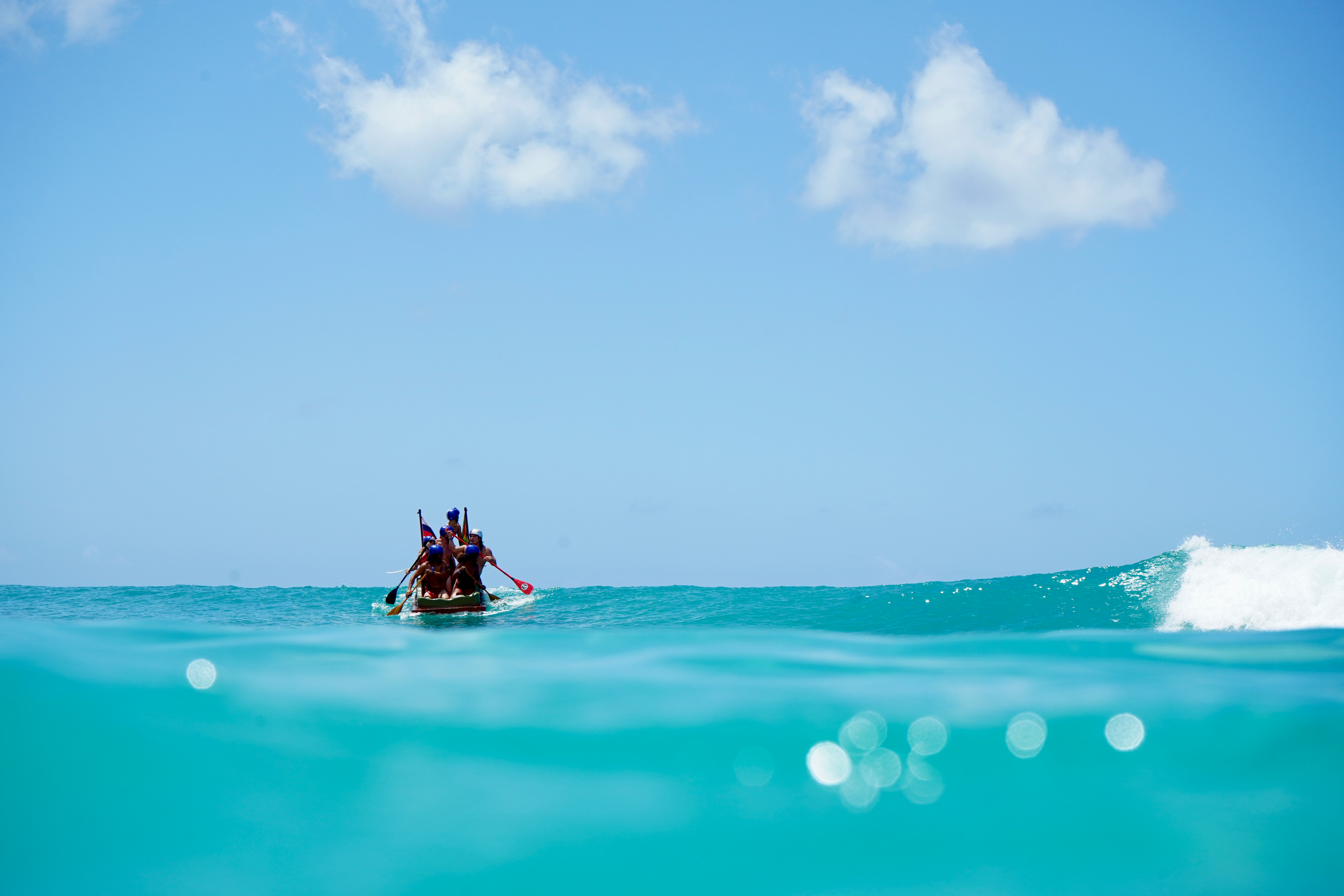 People Riding a Boat in the Sea · Free Stock Photo