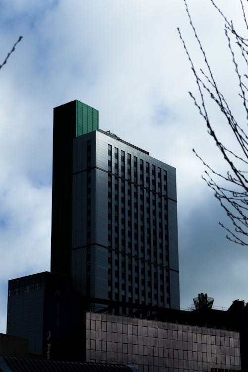 Gray Concrete Building Under Blue Sky