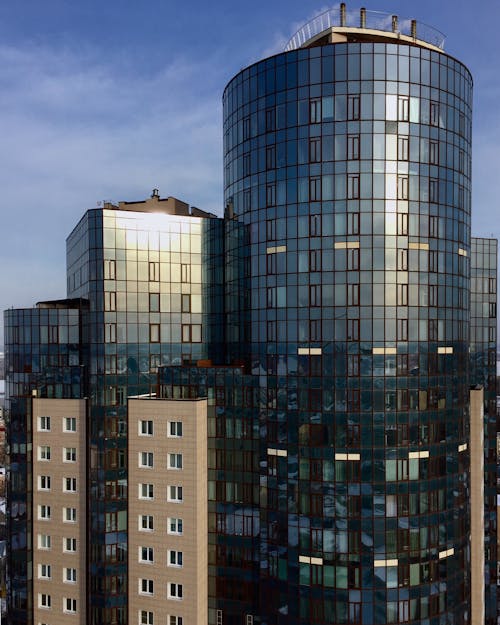 Glass Building under Blue Sky