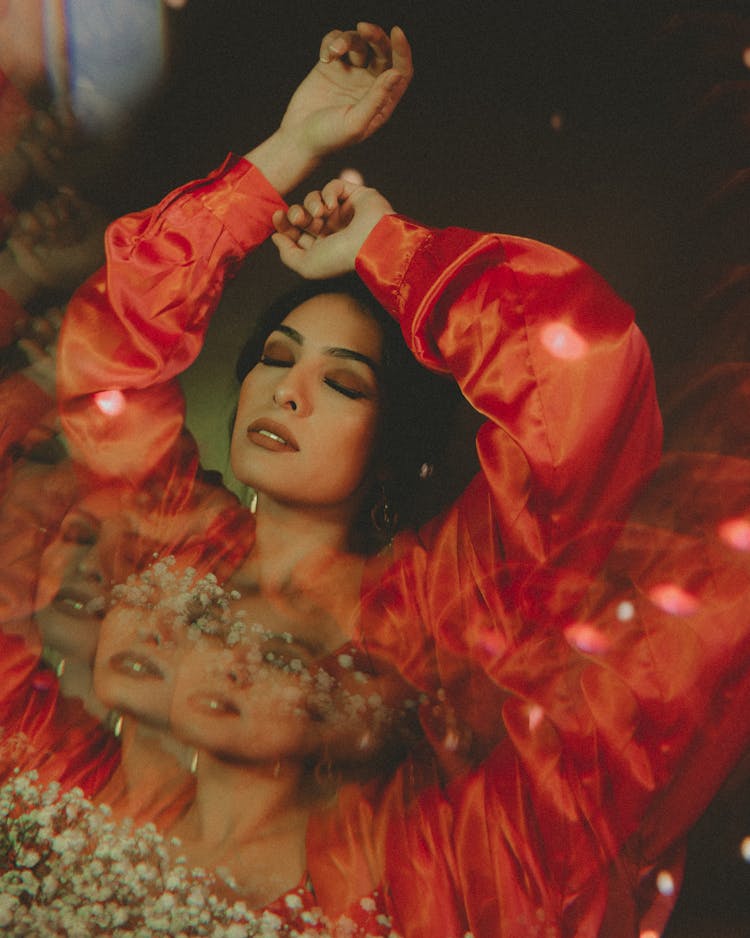 Multiple Exposure Photo Of Woman Holding Her Arms Up