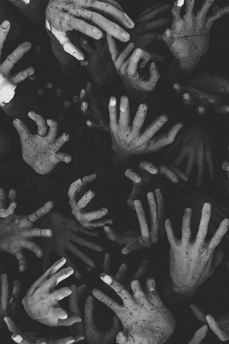 Scary People Hands On Black Background