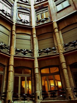Architectural marvel of Casa Mila's iconic stone interior in Barcelona.