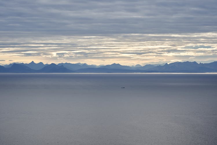 Ship In Sea On Dramatic Dawn