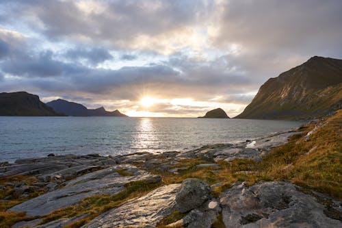 Body of Water Near Mountains