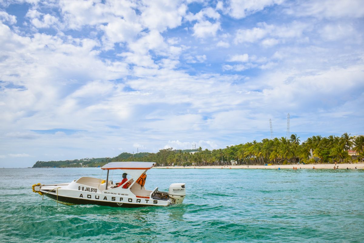 Boracay's White Beach — four kilometers of powder-soft sand, one of Southeast Asia's finest.