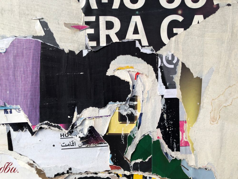 Poster Inposter Rips Ripped Posters on the Wall · Free Stock Photo
