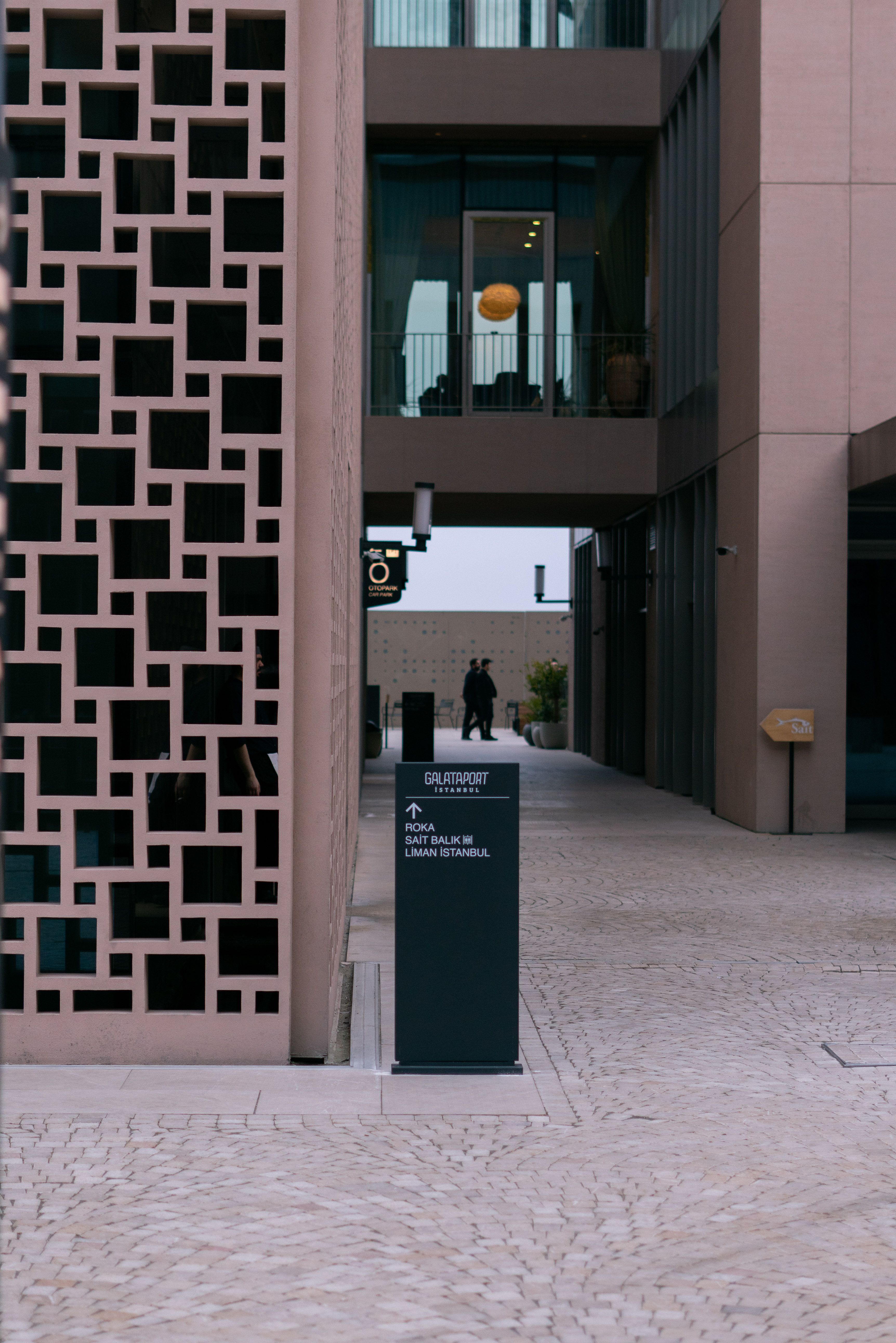 Direction Post Inside a Building · Free Stock Photo