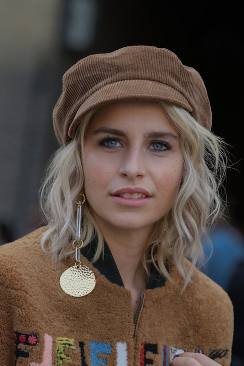 Beautiful Woman Wearing Brown Jacket and Hat