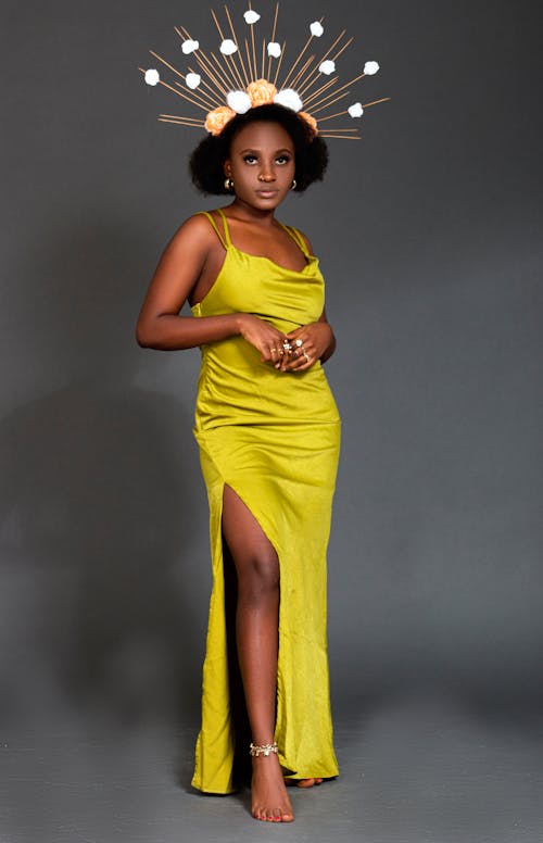 Woman in Yellow Sleeveless Dress Looking Afar