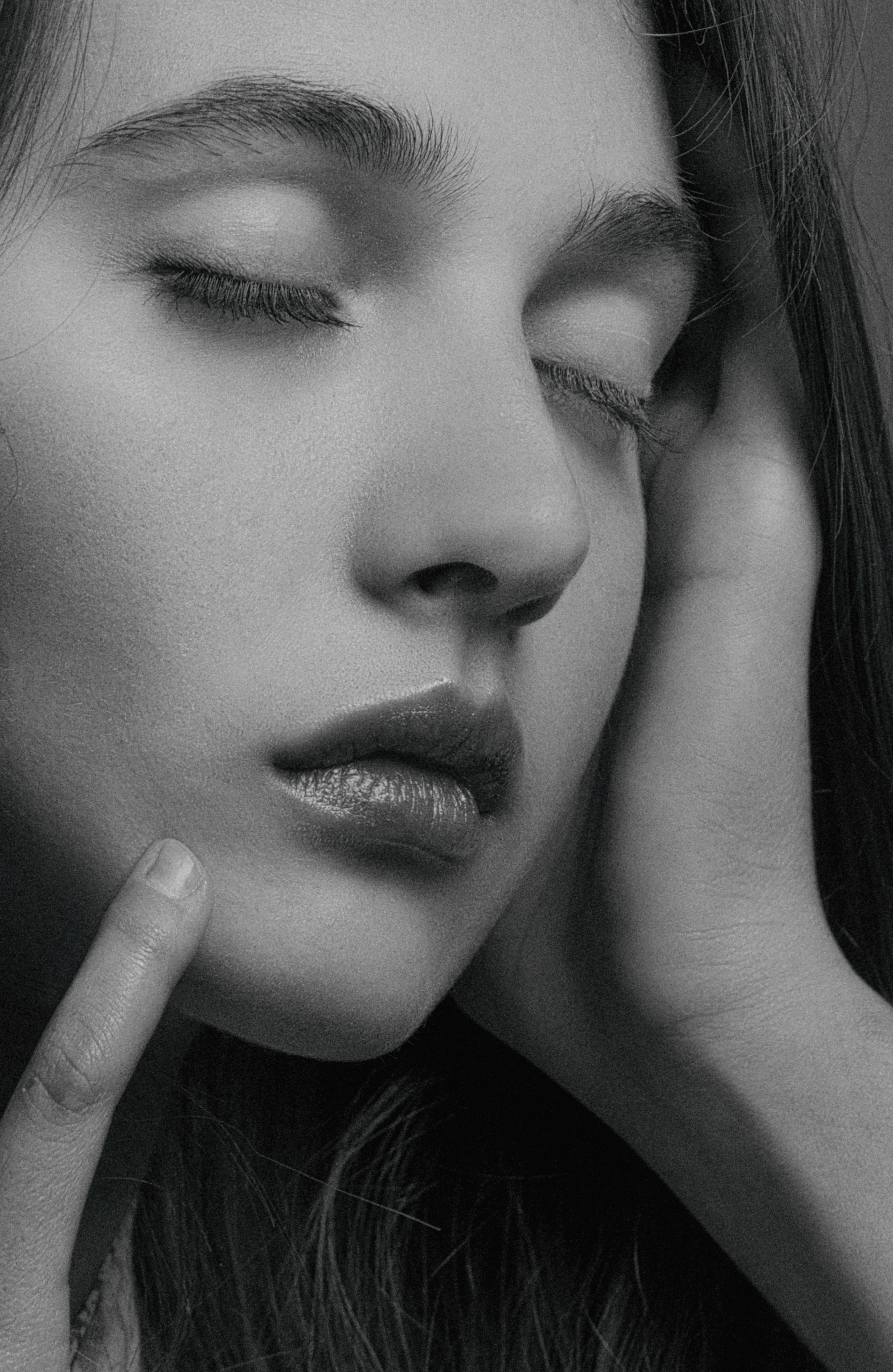 Grayscale Photo of a Woman Touching her Face with her Eyes Closed ...