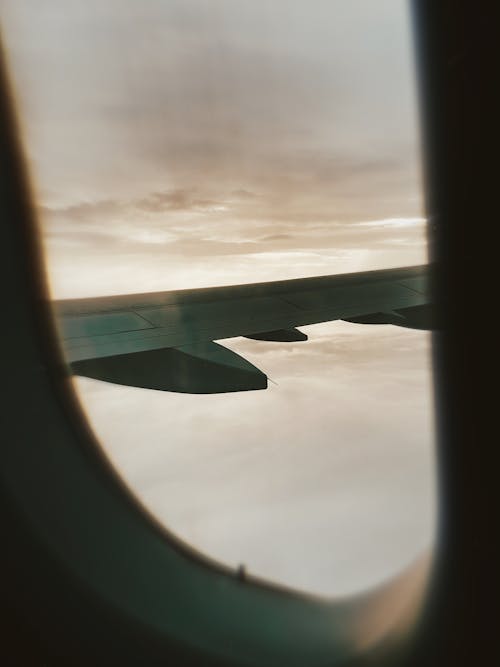 Free An Airplane Window with a View Stock Photo