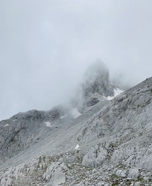 Free Serene rocky mountain landscape in Yunnan, China, shrouded in mist and fog. Stock Photo