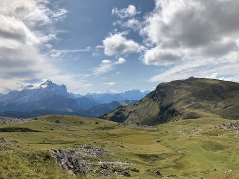 Breathtaking landscape of Veneto, Italy featuring mountains under a cloudy sky.