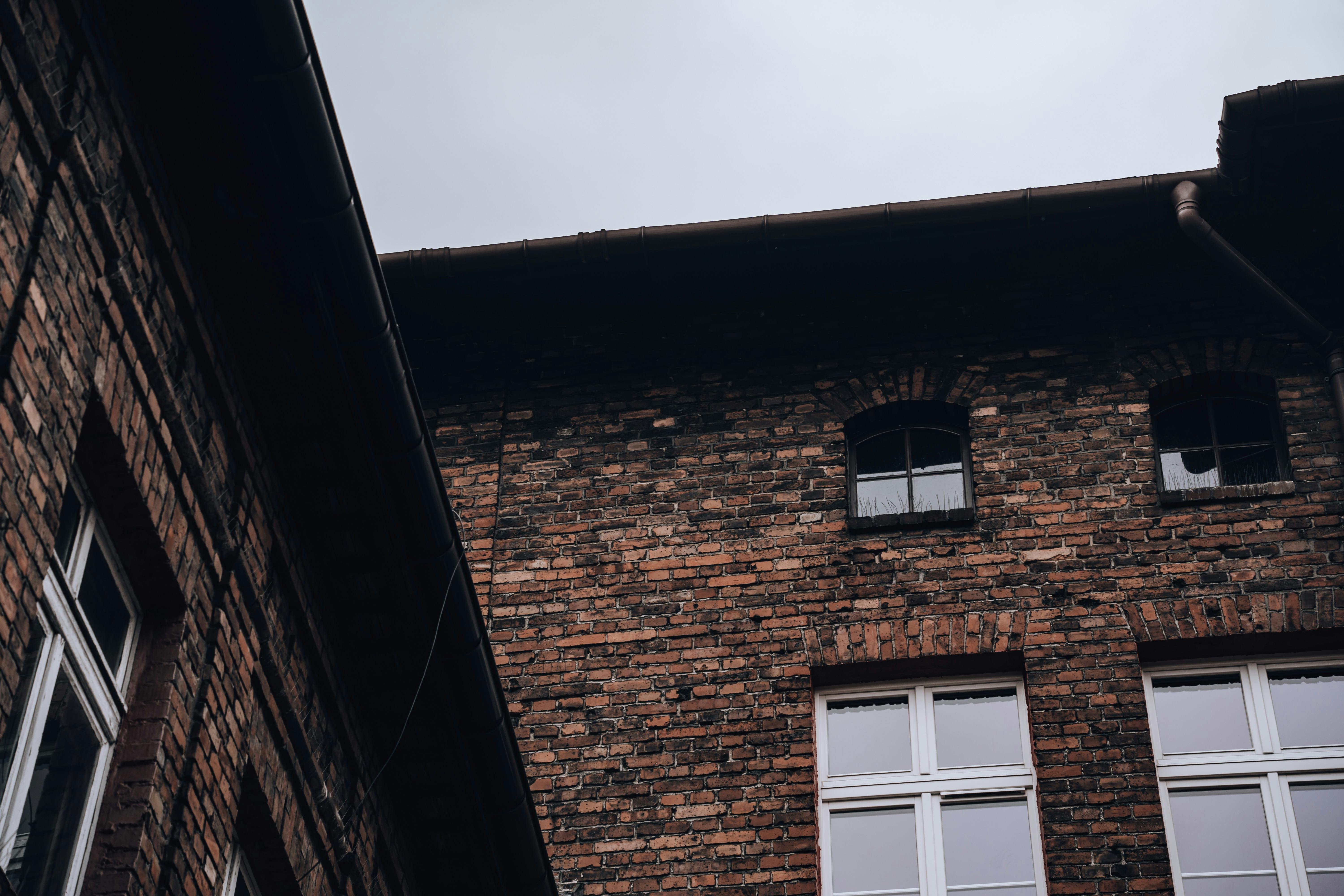 Architectural detail showing gutter and brickwork